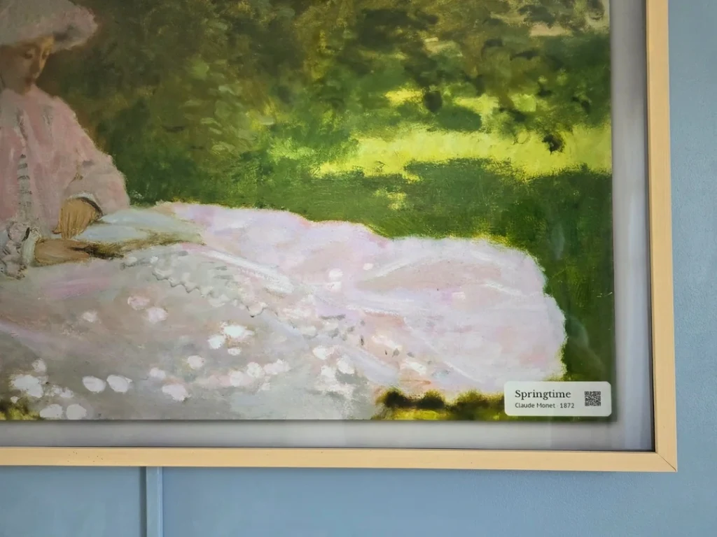 Samsung The Frame TV with Claude Monet Springtime and museum label in real living room